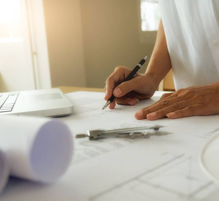 hands-engineer-working-blueprint-construction-concept-engineering-tools-vintage-tone-retro-filter-effect-soft-focus-selective-focus